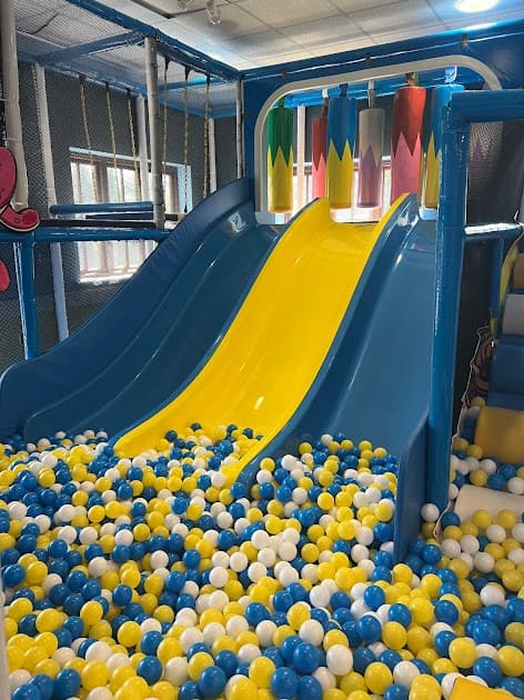 Indoor soft play frame and ball area at a Surrey community venue, free toddler groups and soft play Surrey, parents and carers with under-fives.